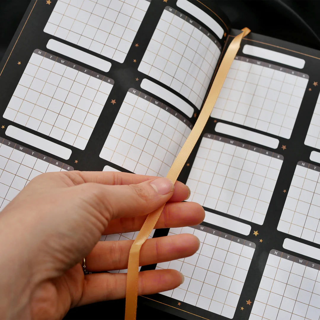 Dateless Wonderland Planner by Quirky Cup Collective